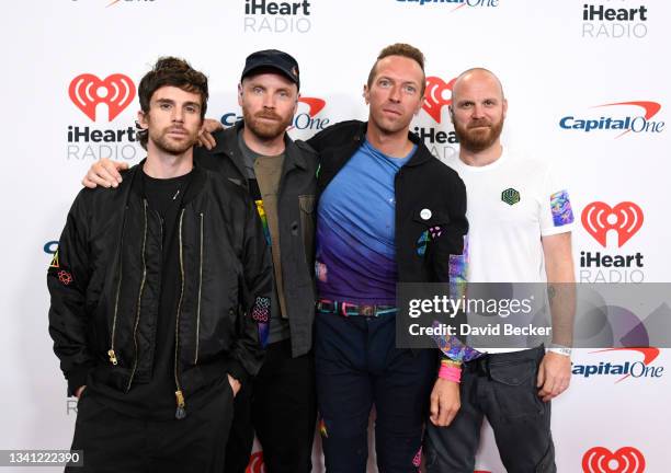 Guy Berryman, Jonny Buckland, Chris Martin, and Will Champion of Coldplay attend the 2021 iHeartRadio Music Festival on September 18, 2021 at...