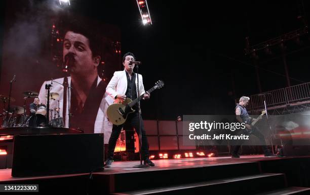 Tré Cool, Billie Joe Armstrong and Mike Dirnt of Green Day perform onstage during the 2021 Life Is Beautiful Music & Art Festival on September 18,...