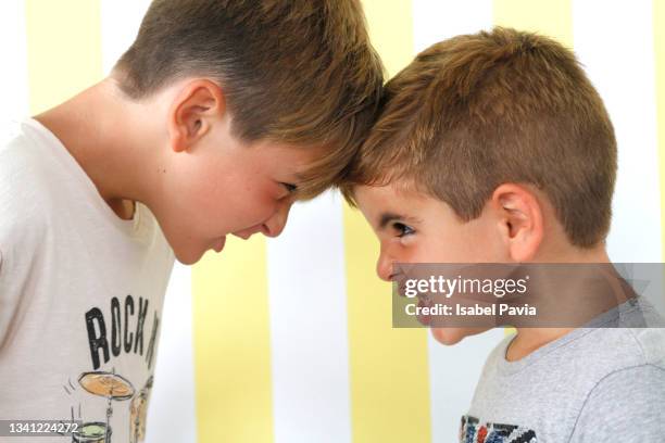 brothers  fighting  violently - sibling conflict stock pictures, royalty-free photos & images