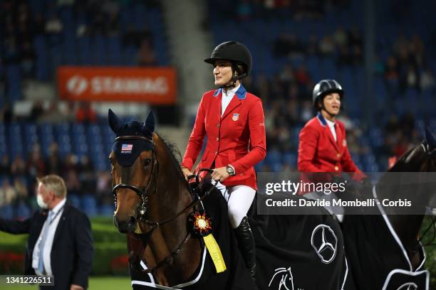 Awards ceremony for the United States of America team Jessica Springsteen riding Don Juan Van De Donkhoeve-Sbs, Laura Kraut riding Baloutinue-HANN,...