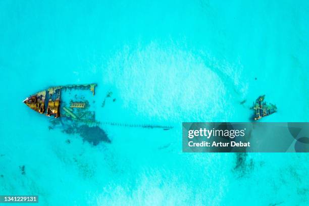 aerial view of the sink ship in the italy coast with blue water. - otranto stock pictures, royalty-free photos & images