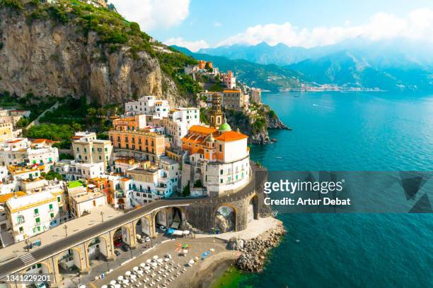 aerial view of the stunning amalfi coast with road and the atrani town with arched road in italy - italien stock-fotos und bilder