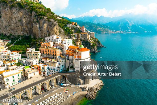 Aerial view of the stunning Amalfi coast with road and the Atrani town with arched road in Italy Aerial view of the stunning Amalfi coast with road and the Atrani town with arched road in Italy