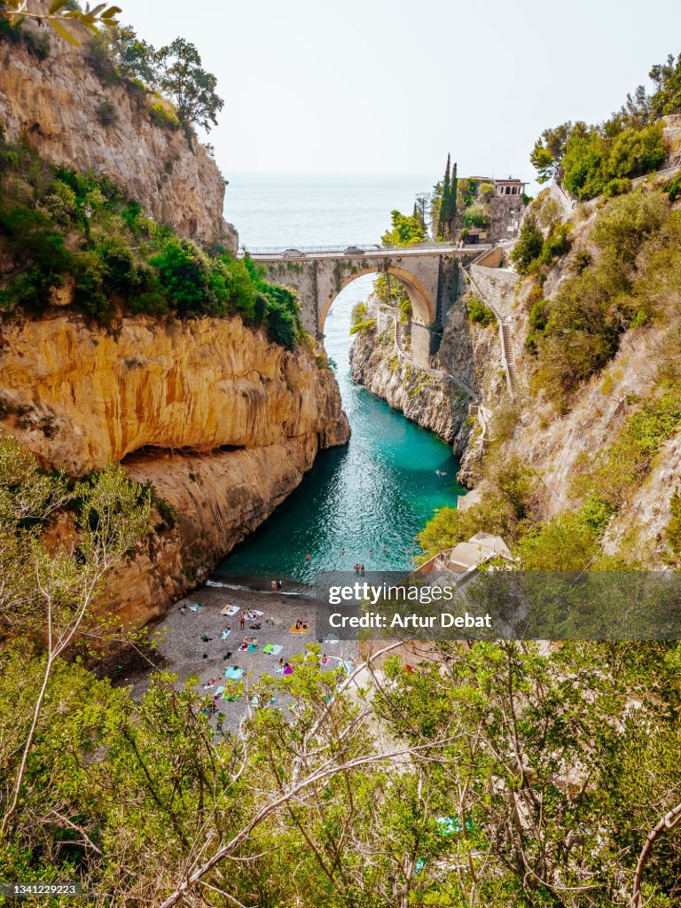 Beautiful view of the Fiordo di Furore in the Amalfi coast with bridge of the scenic road in Italy.