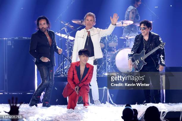 Marco Mendoza, Arnel Pineda, Jonathan Cain, and Neal Schon of Journey perform onstage during the 2021 iHeartRadio Music Festival on September 18,...