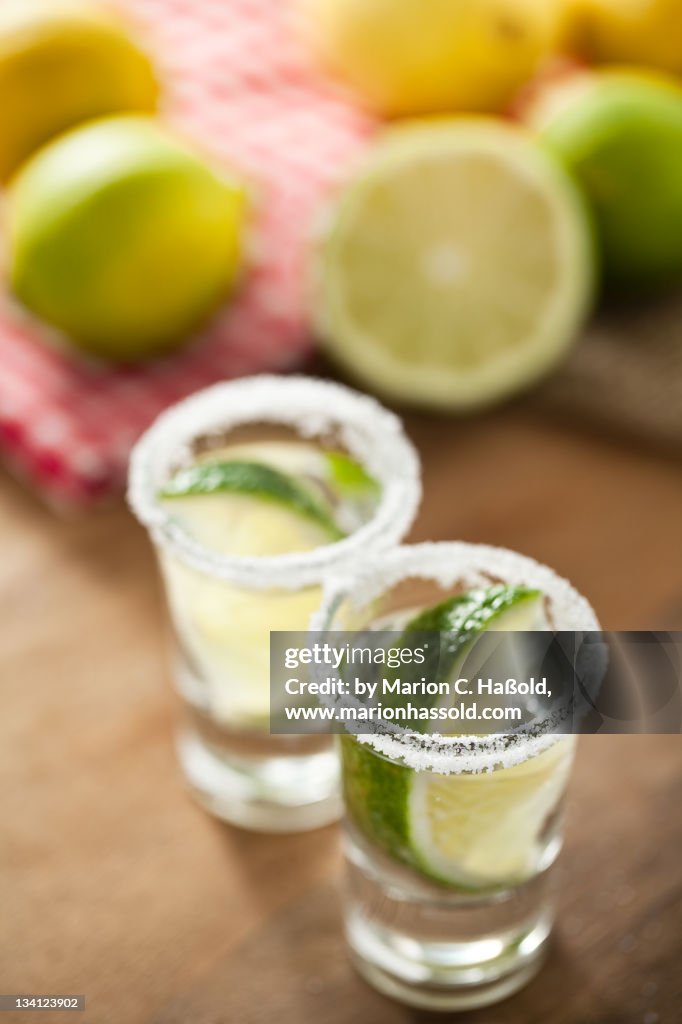 Silver Tequila, limes and salt