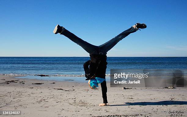 bitch on beach - handstand beach stock pictures, royalty-free photos & images