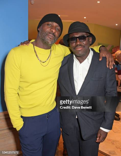 Idris Elba and Edward Enninful attend Roland Mouret presents Terma by Magaajyia Silberfeld, LFW Premiere at The Soho Hotel on September 19, 2021 in...