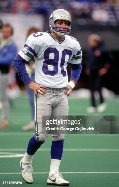 Wide receiver Steve Largent of the Seattle Seahawks looks on from the field before a playoff game against the Cincinnati Bengals at Riverfront...