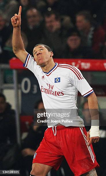 Jeffrey Bruma of Hamburg celebrates after scoring his team's first goal during the Bundesliga match between Hannover 96 and Hamburger SV at AWD Arena...