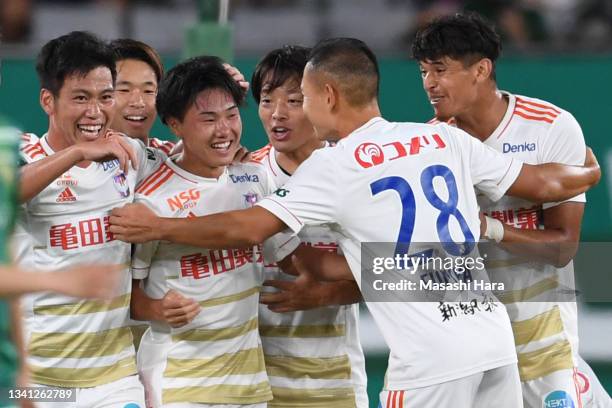 Shunsuke Mito of Albirex Niigata celebrates the first goal during the J.League Meiji Yasuda J2 match between Tokyo Verdy and Albirex Niigata at...