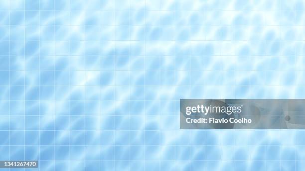 underwater view of sunlight reflecting on the swimming pool floor background - 海中　光 ストックフォトと画像