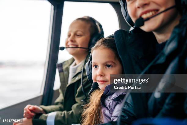family with kids traveling on helicopter - helicopter ride stock pictures, royalty-free photos & images