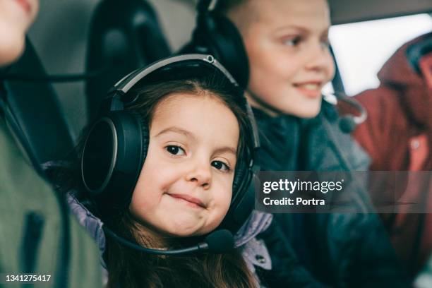 cute girl with family enjoying on a helicopter ride - helicopter ride stock pictures, royalty-free photos & images