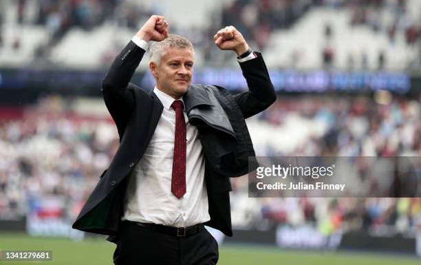 Ole Gunnar Solskjaer, Manager of Manchester United acknowledges the fans after his sides during the Premier League match between West Ham United and...