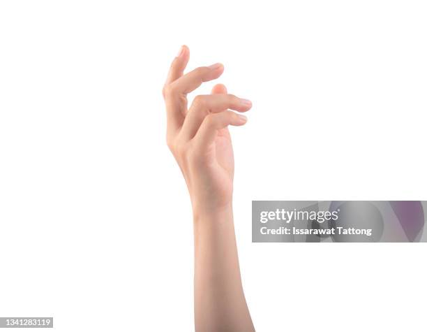 female arm including hand fingers and thumb, the part of body isolated on white background - tenir photos et images de collection