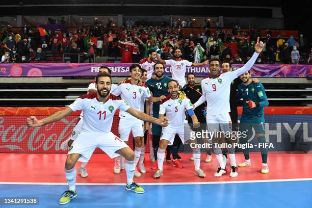 Players of Morocco pose for a photo as they celebrate after the FIFA Futsal World Cup 2021 group C match between Portugal and Morocco at Klaipeda...