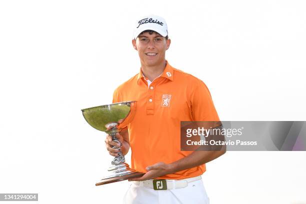 Nordin Van Tilburg of Netherlands poses with the trophy best amateur player during Day Four of the Dutch Open at Bernardus Golf on September 19, 2021...