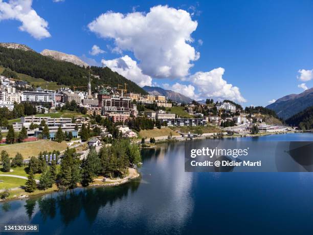 dramatic aerial view of the famous saint moritz village, switzerland - saint moritz stockfoto's en -beelden