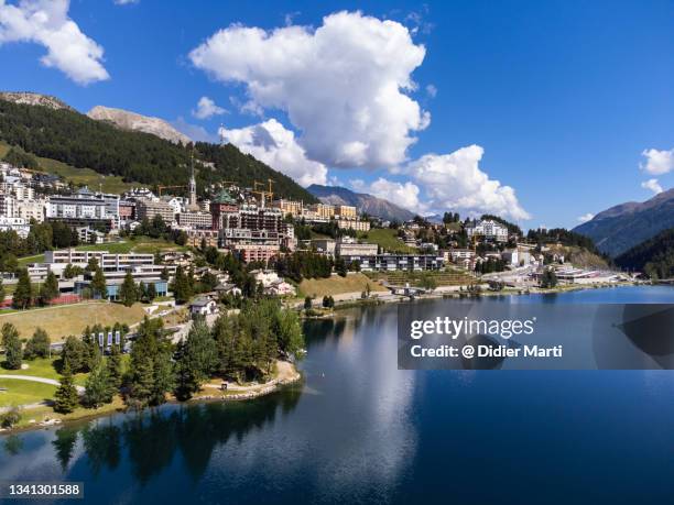 dramatic aerial view of the famous saint moritz village, switzerland - st moritz stock pictures, royalty-free photos & images