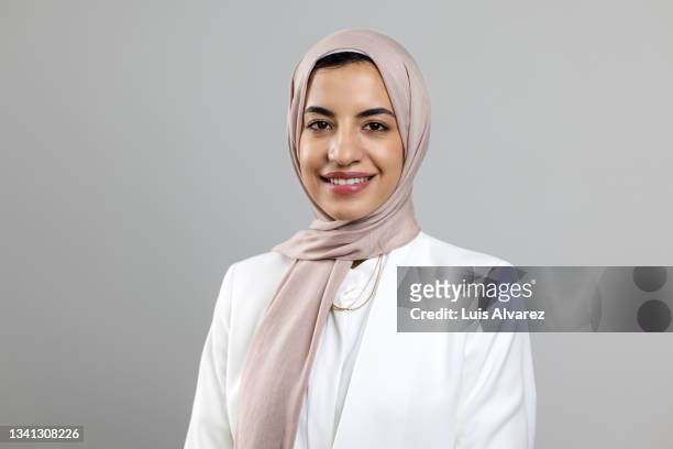studio portrait of a successful middle eastern businesswoman - arab woman portrait stock pictures, royalty-free photos & images