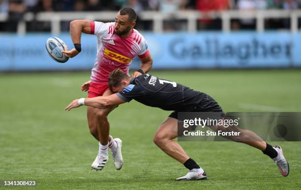 Falcons player Ben Stevenson tackles Joe Marchant of Harlequins during the Gallagher Premiership Rugby match between Newcastle Falcons and Harlequins...