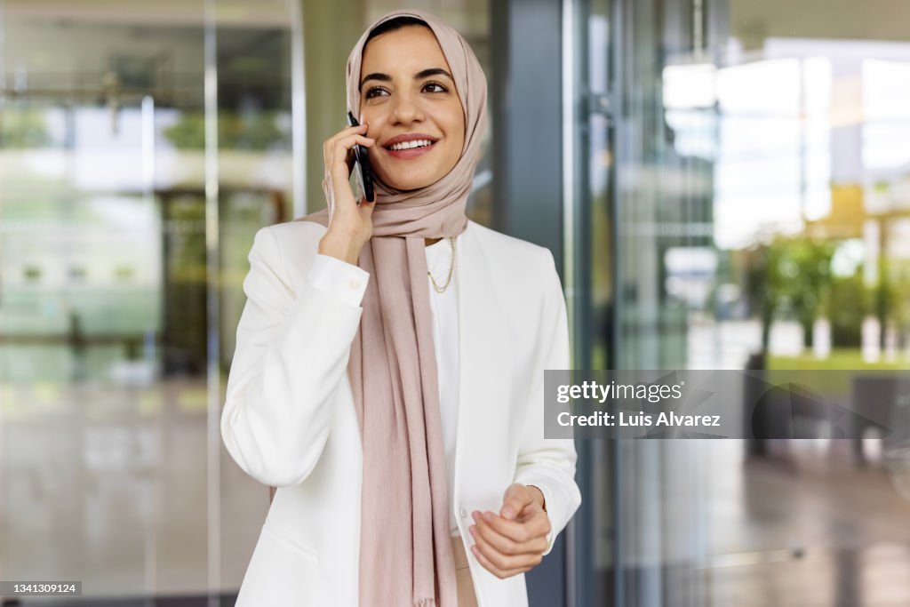 Middle eastern businesswoman talking on phone