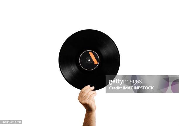 hand holding vinyl record - dj club foto e immagini stock