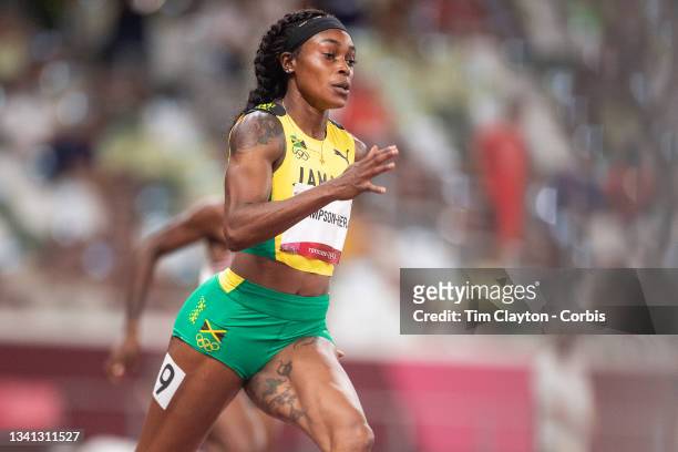 August 2: Elaine Thompson-Herah of Jamaica in action while winning the Women's 200m Semi-Final heat two at the Olympic Stadium during the Tokyo 2020...