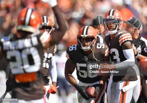 Outside linebacker Malcolm Smith of the Cleveland Browns intercepts the ball in the game against the Houston Texans at FirstEnergy Stadium on...