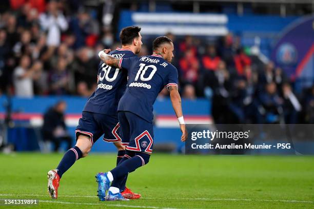 Neymar Jr of Paris Saint-Germain celebrates his goal with teammate Leo Messi during the Ligue 1 Uber Eats match between Paris Saint Germain and Lyon...