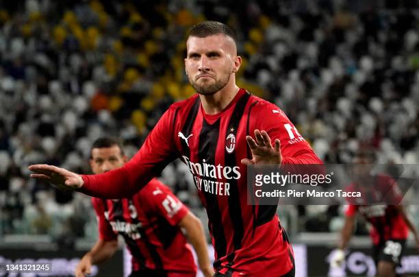 Ante Rebic of AC Milan celebrates after coring their side' during the Serie A match between Juventus and AC Milan at the Allianz Stadium in Turin,...