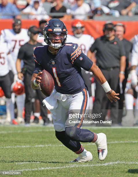 Justin Fields of the Chicago Bears looks for a receiver against the Cincinnati Bengals at Soldier Field on September 19, 2021 in Chicago, Illinois....