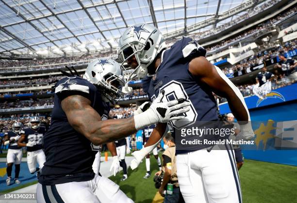 Strong safety Damontae Kazee of the Dallas Cowboys celebrates his interception on a first and goal play in the third quarter against the Los Angeles...