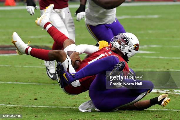 Quarterback Kyler Murray of the Arizona Cardinals is sacked in the fourth quarter of the game against the Minnesota Vikings at State Farm Stadium on...