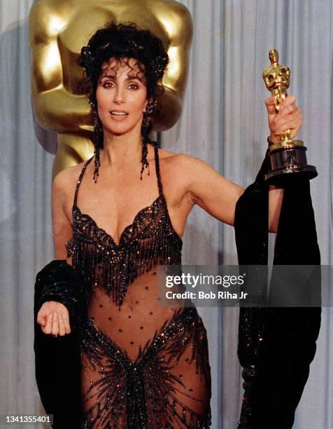 Academy Award winner Cher backstage with her Oscar award, April 11,1988 in Los Angeles, California.