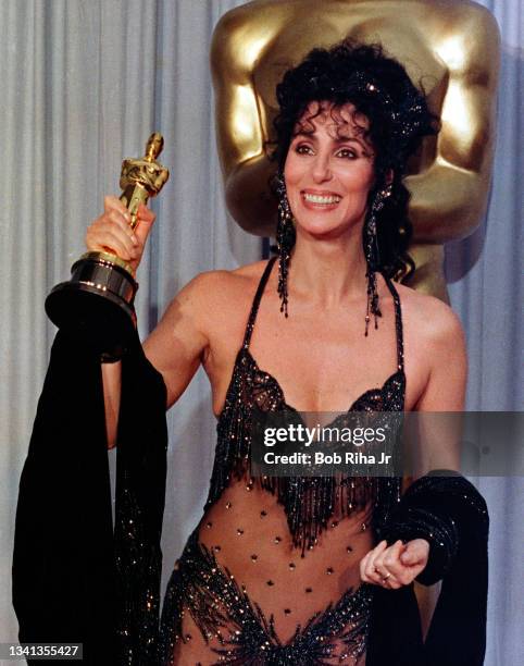 Academy Award winner Cher backstage with her Oscar award, April 11,1988 in Los Angeles, California.