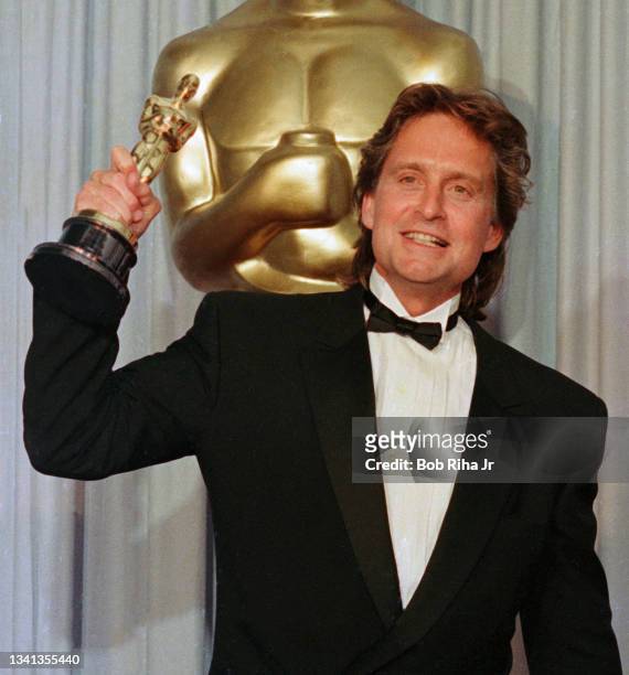 Academy Award winner Michael Douglas backstage with his Oscar Award, April 11,1988 in Los Angeles, California.