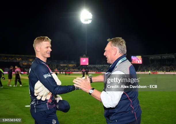 Sam Billings of Kent is congratulated by Director of Cricket Paul Downton during the Vitality T20 Blast Final between Somerset and Kent at Edgbaston...