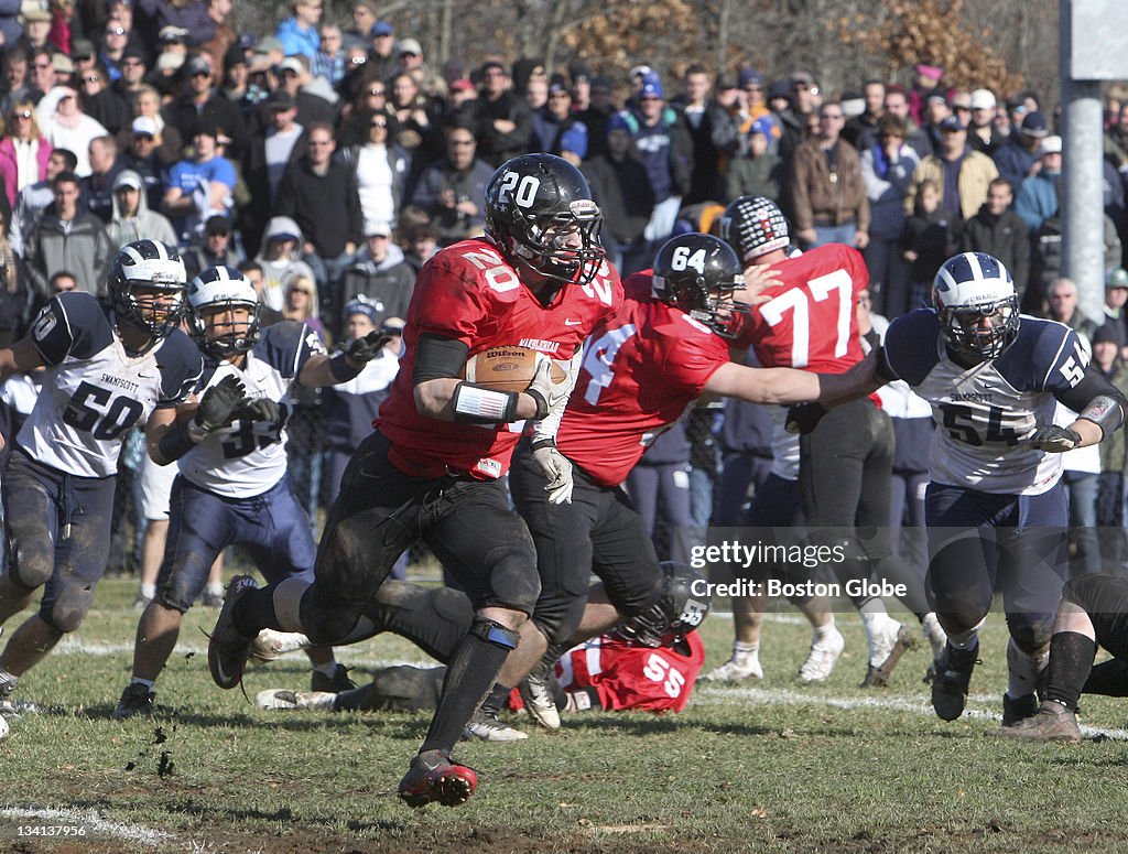 Marblehead's Will Quigley breaks clear during the Thanksgiving Day