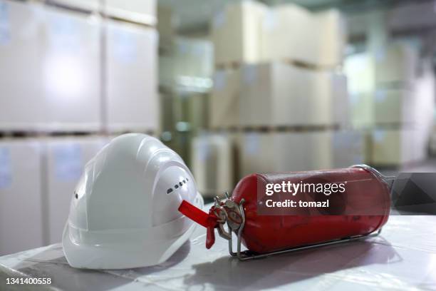 warehouse still life - extinguishing 個照片及圖片檔