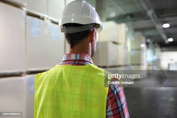 worker in warehouse - paper industry stock pictures, royalty-free photos & images