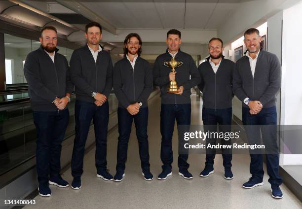 Shane Lowry, Bernd Wiesberger, Tommy Fleetwood, Captain Padraig Harrington, Tyrrell Hatton and Lee Westwood of Team Europe pose for a picture as they...