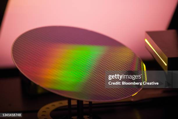 a semiconductor wafer - semiconductor stock-fotos und bilder