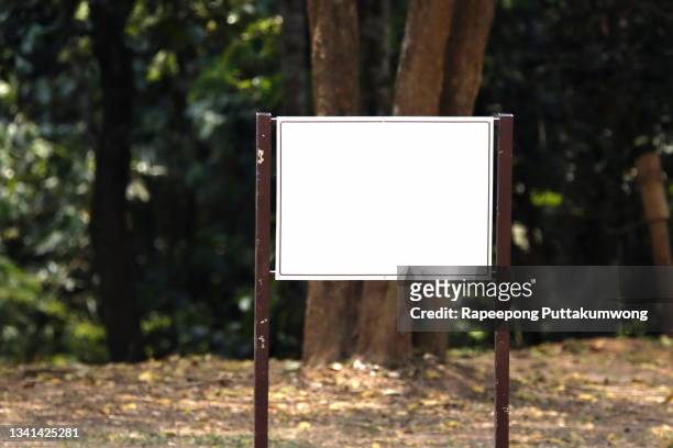 billboard blank for outdoor advertising poster at public park - placard foto e immagini stock