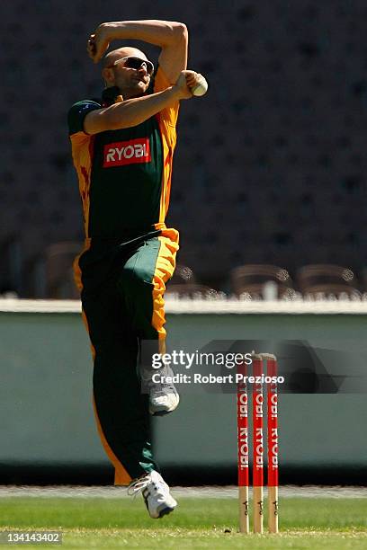 Jason Krejza of the Tigers bowls during the Ryobi One Day Cup match between the Victoria Bushrangers and the Tasmania Tigers at Melbourne Cricket...