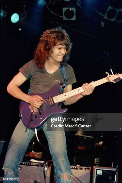 Guitarist Eddie Van Halen plays a rare purple Charvel guitar at a special performance with Allan Holdsworth at the Roxy Theatre on April 29, 1982 in...