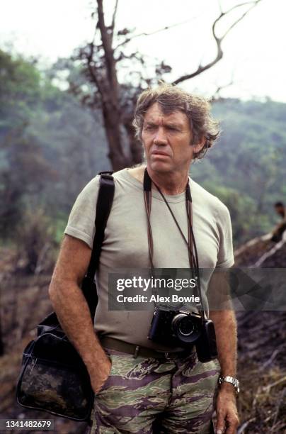 English war photographer Don McCullin with his favourite Olympus camera in the Philippines, 7th November 1986.