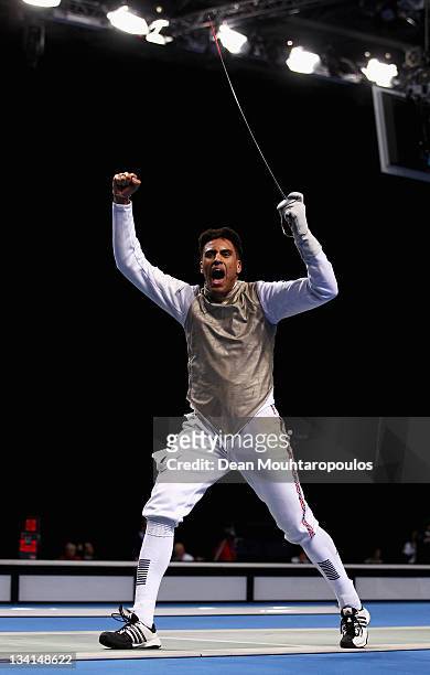 Jamie Davis of Great Britain celebrates his victory over Tommaso Lari of Italy during the Men's Foil Team Event at the Fencing Invitational, part of...