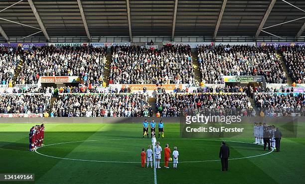 The players hold a minutes silence in memory of Wales manager Gary Speed before the Barclays Premier League match between Swansea City and Aston...